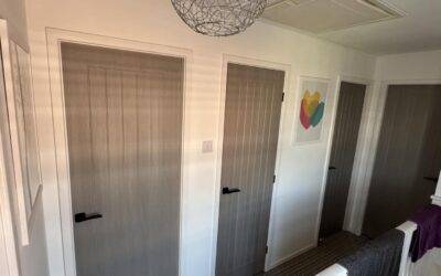Fitting Customer Supplied Grey Laminate Doors With Matt Black Furniture In Ingleby Barwick